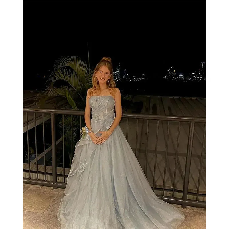 Elegant Blue Strapless A-Line Prom Dress – Puffy Tulle Gown with Ruffles and Appliques for Graduation and Special Occasions